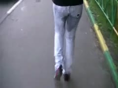 This girl piddled in her underwear, soaking her jeans.